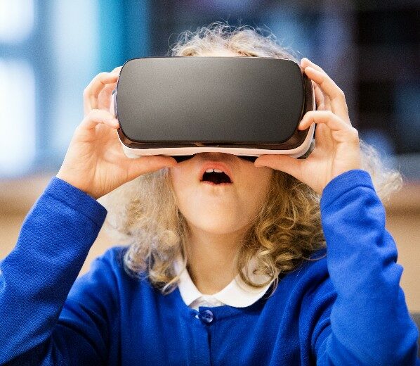 Independent schoolgirl with VR